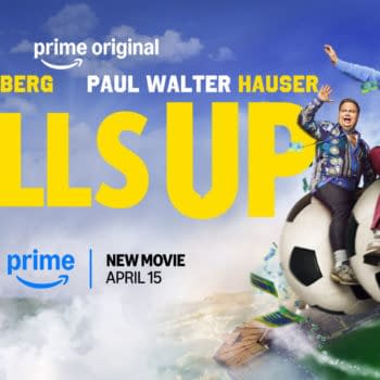 A promotional illustration for the movie 'Balls Up,' featuring two men joyfully riding large soccer balls against a cloudy sky backdrop. The title 'BALLS UP' is prominently displayed in bold yellow letters, along with names and the release date for Prime.
