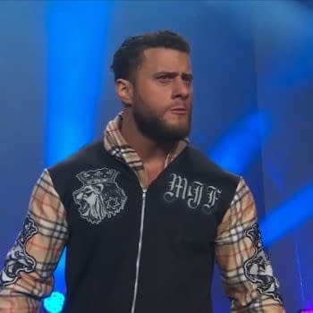 MJF stands on the AEW Dynamite stage with a confused, frustrated expression, reacting to Darby Allin refusing him a rematch.