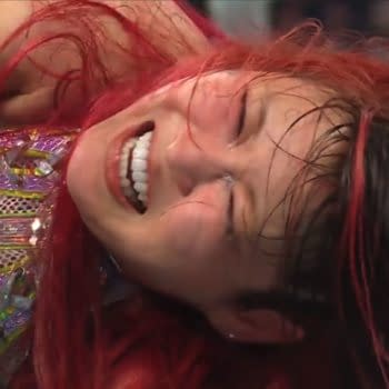 IYO SKY smiles in a close-up after winning at WWE Backlash.