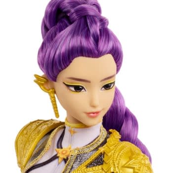 KPop Demon Hunters Rumi doll with purple braided hair, gold outfit details, and a white background.