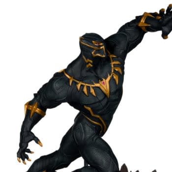 Black Panther Marvel Rivals statue in a dynamic action pose, shown in black armor with gold accents against a white background.