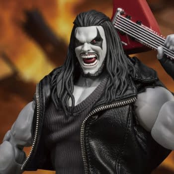 A DC Comics Lobo action figure snarls while holding a red guitar over his shoulder, with long black hair and a black leather vest against a fiery background.