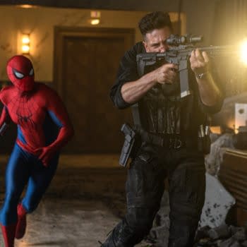 Spider-Man runs through a hotel hallway as a man in tactical gear fires a rifle, creating a bright muzzle flash.