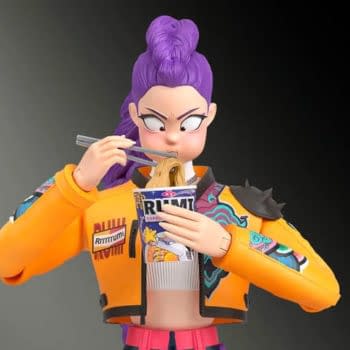 Rumi from KPop Demon Hunters is shown as a stylized figure with purple hair, wearing an orange jacket and eating noodles with chopsticks. The collectible figure is posed against a dark background.