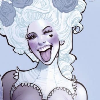 A stylized comic illustration of a woman with powdered white hair, heavy eye makeup, and a playful expression, with a heart on her cheek and her tongue out.