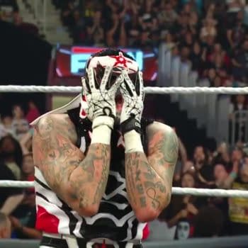 Penta celebrates winning the chance to lose to Roman Reigns in Mexico at the end of WWE Raw