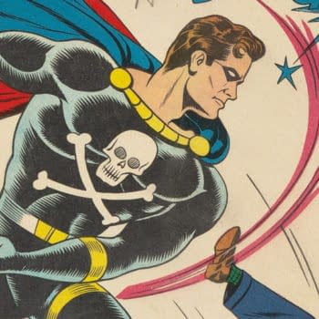 Vintage comic book cover art for Black Terror #16 showing the Black Terror in a dramatic action pose beside a red rocket or meter graphic. The cropped close-up emphasizes the superhero’s black costume, skull emblem, and flowing cape.
