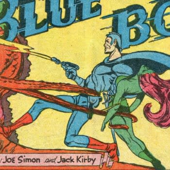 Blue Bolt #5 (Novelty Press, 1940) interior splash detail, credited to Joe Simon and Jack Kirby. Blue Bolt fires a ray gun beside the Green Sorceress as a creature extends tendrils toward them; the joint byline is visible below.