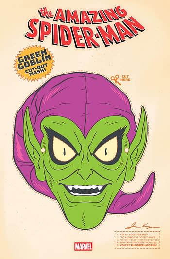 A cut-out mask design of the Green Goblin from Marvel's 'The Amazing Spider-Man'. The mask features an exaggerated green face, pointed ears, and a purple hat, with instructions for assembly included.