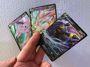 A Closer Look At The Pokmon TCG Eeveelution V Heroes Tins