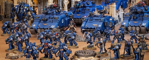A whole smattering of Ultramarines from Warhammer 40,000, a miniature-based wargame by Games Workshop, takes the field.