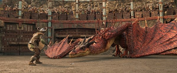 A dramatic scene from 'How To Train Your Dragon' featuring a young Viking confronting a large, menacing dragon in a stone arena, with spectators watching from above.