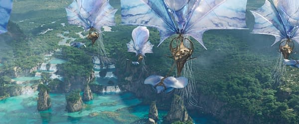 A scene from 'Avatar: Fire and Ash' featuring floating airships with translucent, colorful sails navigating above lush, green landscapes and cascading waterfalls, set against a vibrant blue water backdrop.