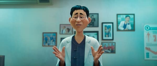 An animated character in a lab coat enthusiastically speaks while gesturing, set against a backdrop of framed photos. This character is likely from a series involving K-pop superstars who double as demon hunters, highlighting themes of music and fantasy.