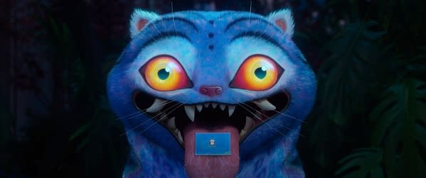 A colorful cartoon character with large, expressive eyes and sharp teeth, sticking out its tongue while holding a small card. The vibrant blue fur and playful expression suggest a whimsical theme linked to supernatural adventures.