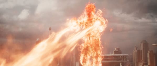 Joseph Quinn portrays Johnny Storm, also known as the Human Torch, surrounded by flames in a dynamic pose, representing the character in 'The Fantastic Four: First Steps' from Marvel Studios.