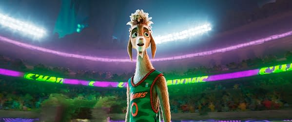 A cartoon goat character, wearing a basketball jersey, stands in a vibrant arena filled with colorful lights and cheering fans. The goat appears excited, embodying a sporty and lively atmosphere.