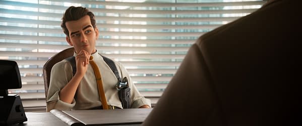 Animated character Raymond Gunn sits at a desk in a bright office, looking thoughtful in a white shirt with suspenders.