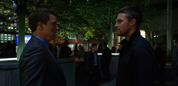 Malcom and Oliver meet on Arrow, courtesy of The CW.