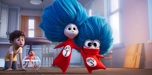 Animated scene from The Cat in the Hat showing the Cat and Thing 2 with huge blue hair standing in a bright kitchen while a boy watches nearby.