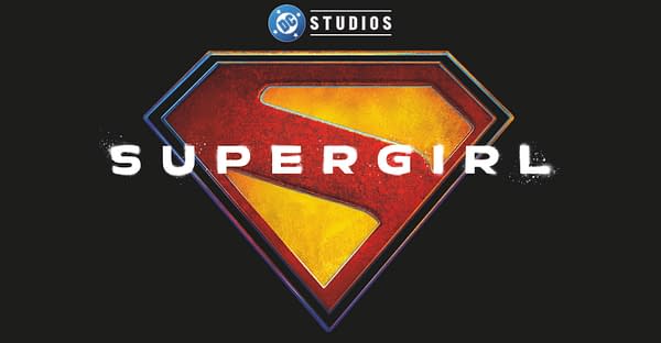 A logo featuring the iconic red and yellow Superman emblem with a stylized 'S,' accompanied by the word 'SUPERGIRL' in bold white letters below it, all set against a black background. The 'DC STUDIOS' label is positioned above the emblem.