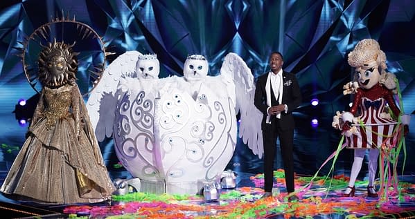 THE MASKED SINGER: L-R: Sun, The Snow Owls, host Nick Cannon and Popcorn in the 