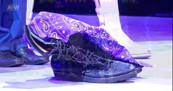 On AEW Dynamite's Brodie Lee tribute episode, Lee's son retired Lee's boots in the ring.