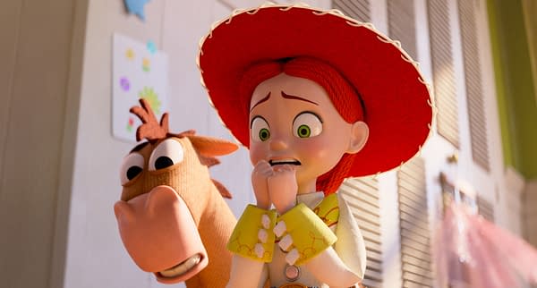 A scene from 'Toy Story 5' featuring Jessie, with red hair and a large red hat, looking nervous while biting her fingers, alongside Bullseye, her horse companion. The background shows colorful drawings, typical of a child's room.