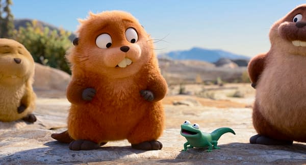 A colorful animated scene from Disney and Pixar's "Hoppers," featuring a cheerful orange beaver character named Loaf, alongside Mabel Beaver and Tom Lizard, who is a small green lizard with large eyes, set in a bright outdoor landscape.