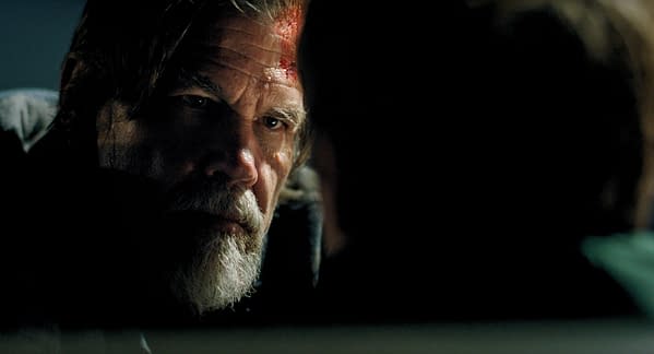 Josh Brolin as Mitt Gardiner in Whalefall, shown in a tense close-up with a bloodied forehead and a serious expression.