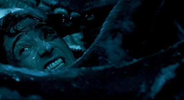 Austin Abrams as Jay Gardiner struggles underwater in a tense scene from Whalefall.
