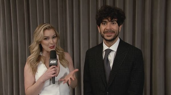 Believe it or not, this is not Tony Khan's prom photo. Khan is being interviewed by Renee Paquette on AEW Dynamite.