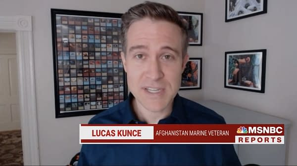 A shot of MO U.S. Senate candidate Lucas Kunce. In the background, an alleged uncut sheet of common Beta cards can be seen. (Image attributed to MSNBC)