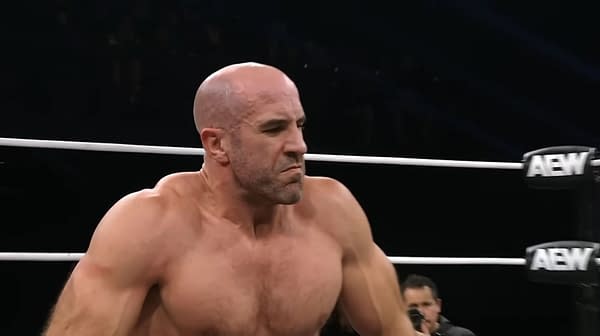 Claudio Castagnoli, a bald wrestler with a muscular build, is actively competing in the Continental Classic on AEW Dynamite. He appears focused and determined in the ring, with the audience visible in the background.