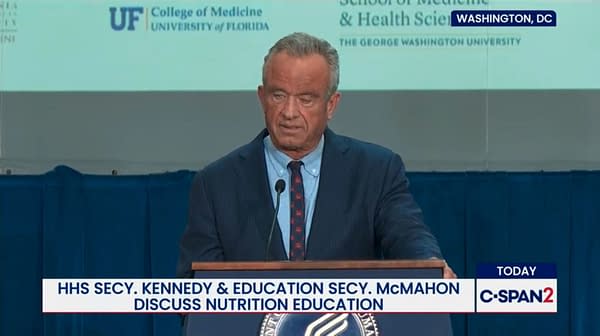 Robert F. Kennedy Jr. stands at a podium during a Washington, DC press conference about nutrition education, with C-SPAN2 graphics on screen.