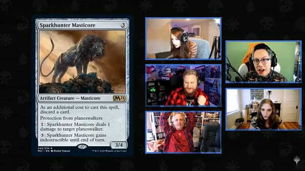 Sparkhunter Masticore, a new card from Core 2021, surprising many Magic: The Gathering streamers via webcam.