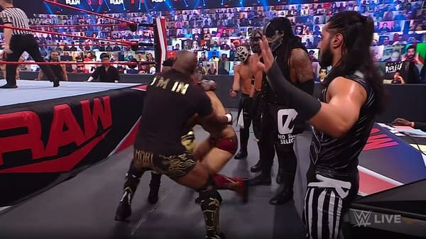 Showing just how far they have fallen, Retribution stands aside as Hurt Business, the physical manifestation of uncontrolled capitalism in WWE, upholds the corporate hegemony by tossing The Miz back into the ring with Bobby Lashley.