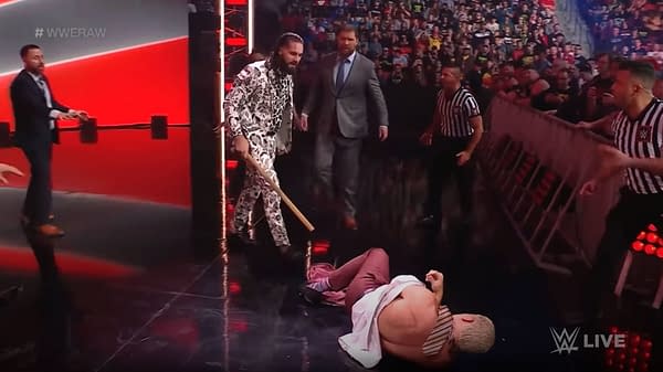 Seth Rollins assaults Cody Rhodes on WWE Raw