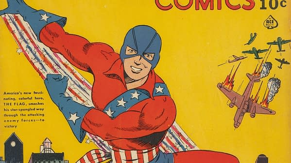 Our Flag Comics #2 (Ace, 1941). A vibrant comic book cover features a muscular superhero, The Flag, wearing a blue mask and red shirt adorned with stars. He is energetically flying while holding a large star-spangled banner, with vintage aircraft battling in the background against a bright yellow backdrop.