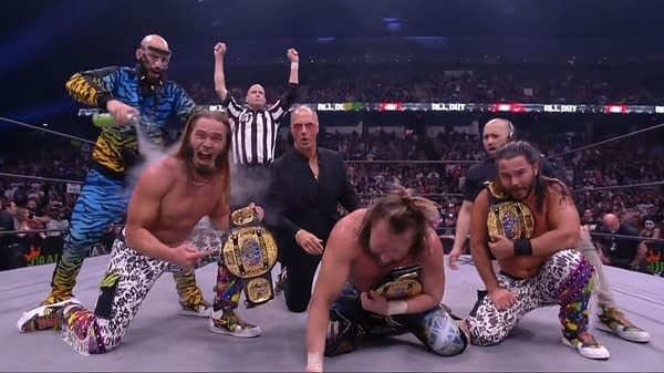 The Elite celebrate becoming inaugural AEW World Trios Champions at All Out