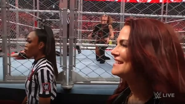 Lita helps Becky Lynch defeat Bayley in a steel cage on WWE Raw