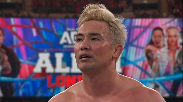 Kazuchika Okada stands in the AEW ring during an AEW All In London International Championship triple threat match, looking focused and winded.