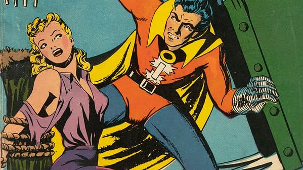 Super-Mystery Comics #3 (Ace, 1940) featured image from the cover. Magno frees himself from a giant machine beside a bound woman