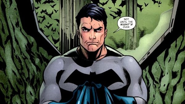 DC Comics' Bruce Wayne, in Batman costume sans cowl, deep in thought.