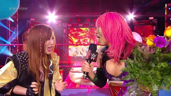 RAW Women's Champion Asuka takes the mic, courtesy of WWE.
