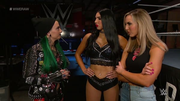 Ruby Soho (then Ruby Riott) appears on WWE Raw with the Iiconics. All three have since been fired.
