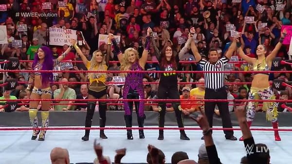 Trish Stratus and Lita team with Sasha Banks and Bayley in happier times.