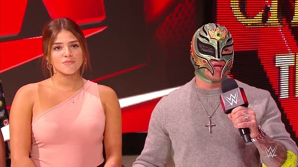 Rey Mysterio and his daughter Aalyah listen to Seth Rollins' reveal the results of a paternity test on WWE Monday Night Raw