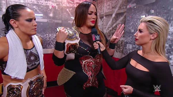 Nia Jax, alongside Shayna Baszler, talks to Sarah Schrieber ahead of her botch.