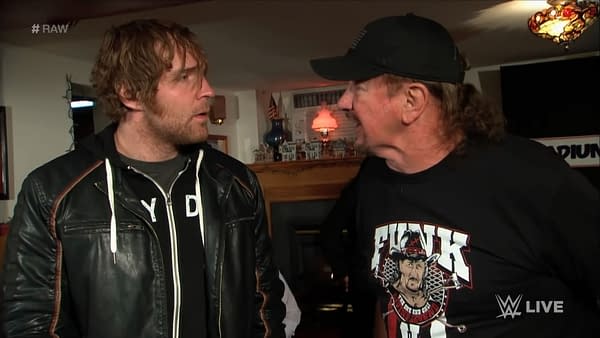 Terry Funk lends his chainsaw to Jon Moxley, then known as Dean Ambrose, ahead of a match against Brock Lesnar in 2016.